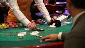 aye4d login live dealer studio on mobile app showing blackjack table with professional dealer